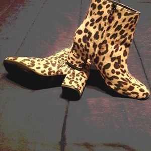 Animal print low rise boots.